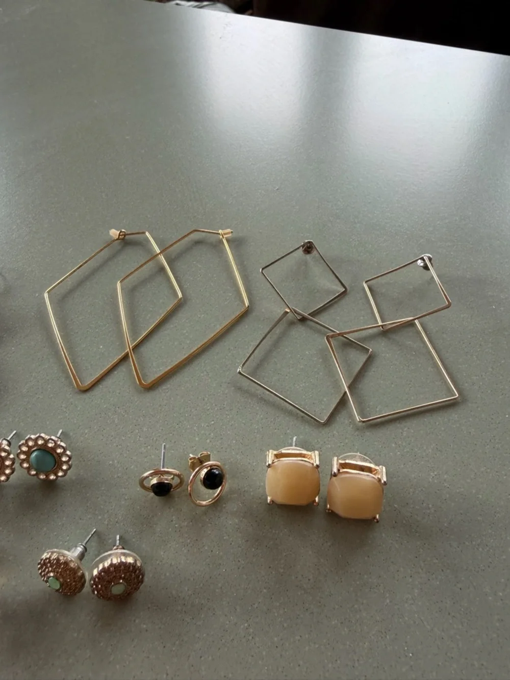 Lot - 9 pairs stud and dangle statement earrings